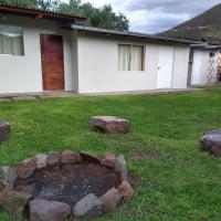 Casa con jardín y vista a las montañas Pisac