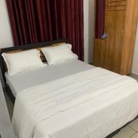 Wayanad Rooms Izza, hotel di Sultan Bathery