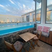 منتجع تربل فور - Triple Four Resort, hotel poblíž Mezinárodní letiště Prince Nayef bin Abdulaziz - ELQ, Burajda