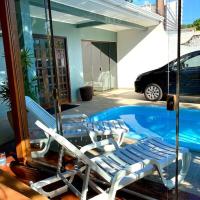SHOW RURAL 2024- casa com ar e piscina, hotel near Adalberto Mendes da Silva Airport - CAC, Cascavel
