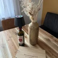 Ferienwohnungen Weinbergglück, отель в городе Лауда-Кёнигсхофен