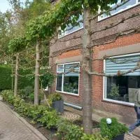 Klooster Achthuizen, hotell i Achthuizen