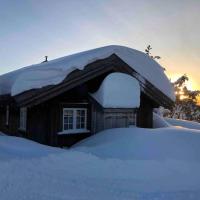 Solehøgda 71. Unik tømmerhytte som er håndlaget