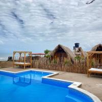 Guajira Beach, готель у місті Ріоача