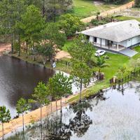 Ampla casa de sítio com lagoa., hotel malapit sa Humberto Ghizzo Bortoluzzi Airport - JJG, Jaguaruna