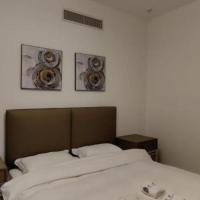 Holiday Room, отель в Дубае, в районе Аль-Авир