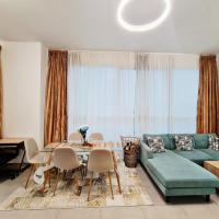 LUXURIOUS TV LOUNGE with private balcony in a 2bhk apartment