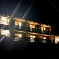 guesthouse Amami Long Beach2, hotel in Koshuku