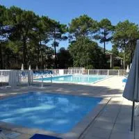 Résidence Les Grands Pins - T2 avec piscine, hotel di Carcans