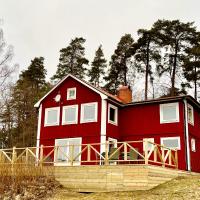 Flemma Gård The lake view with sauna