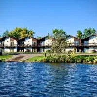 Bridge Inn Tomahahwk - 1st Floor, Room 106,1 King Bed, Pet Friendly, Laminate Wood Flooring, Walkout, River View, Price Includes 1 Pet Fee, hotel v destinácii Tomahawk