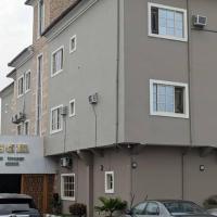 Kosam Global Hotel and Suites, hotel di Uyo