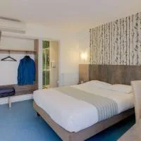 Brit Hotel Dijon Sud، فندق في كوشي