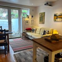 Comfy child/dog friendly garden flat heart Camden