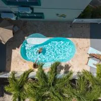 Turtle Bay Inn, отель в городе Лахас