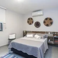 Pê na areia 1 Loft Praia de Itaipú, hotel u gradu Itaipu