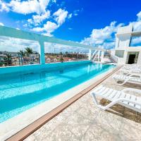DUKASSI SUITES Hotel ROOMS BEACH Bavaro WIFI Parking ROOFTOP POOL & SPA, hotel in Punta Cana