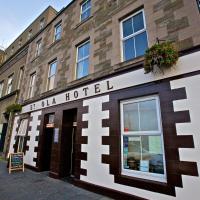 a building with a hotel sign on the side of it at St Ola Hotel, Kirkwall