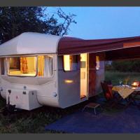 Retro Caravan with Mountain Views