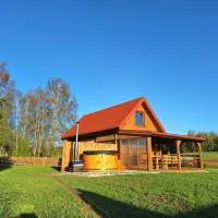 Domek letniskowy ze stawem, hotel em Harsz