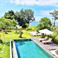 Tegallengah में, होटल JOGLO APONG Beachfront Apartment