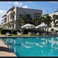 OASIS BEACH APPARTEMENT MEUBLé RESIDENCE FERMÉE AVEC PISCINE TAMARIS 2 SIDI RAHAL, hotel v destinácii Sidi Rahal