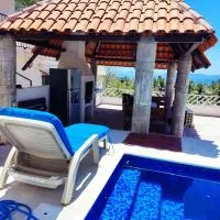 Villas las Palmeras Casa Canaria 12 personas, hotel di La Manzanilla