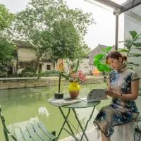 Viesnīca Tongli Slowlife River View Inn pilsētā Sudžou