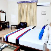 Calming Residence, готель в районі Johar Town, у Лахорі