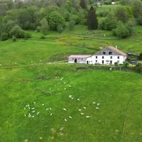 La Ferme sous les Hiez, מלון בקורנימו