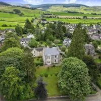 Above & Beyond at Warriston Lodge, מלון במופאט
