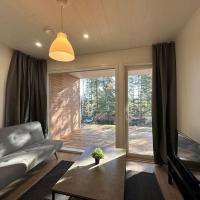 Kotimaailma - Uusi rivitalokolmio saunalla # 2，位于科科拉科科拉-皮塔尔萨里机场 - KOK附近的酒店