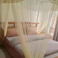 Room in Guest room - Charming Room in Kayove, Rwanda - Your Perfect Getaway, hotell i Kayove