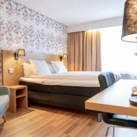 First Hotel Dragonen: Umeå şehrinde bir otel