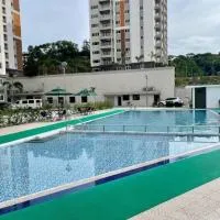 Cozy Condo in Clark Pampanga with Free Parking & Pool Access, hotel Mabalacatban