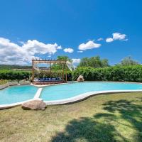 Villa con piscina e giardino, hotell i Cala Bitta