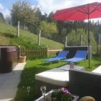 Wellness Oase - Privater Whirlpool & Sauna, hotel en Rüeggisberg