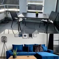 PISO SUPERIOR - Exklusives Apartment an der Promenade mit Rheinsicht & Loggia, отель в городе Эммерих