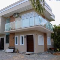 Casa Beira-Mar na Praia da Ferrugem Unidade Diamond, hotell i Garopaba