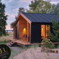 Werder Chalet -- GROßES SONNENDECK -- Strand 150m I Sauna I eKamin I bis 8 Pers I Meerblick I by "Meyers am Meer", viešbutis mieste Boiensdorf