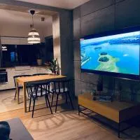Korony Drzew - Apartament nad jeziorem - prywatny pomost, hôtel à Mrągowo