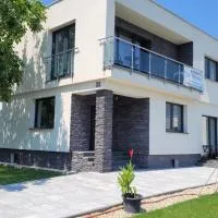 Apartmány Pavlík, хотел в Nesvady