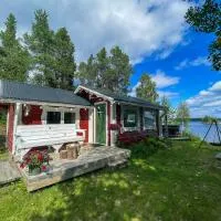 Laplandliv cabin on the lake, hotell i Björkliden
