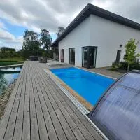 Apartamentai su privačiu baseinu Palangoje, hotel u gradu Vydmantai