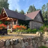 Drewniany Domek w Zakątku Andrzeje Śniczany 18, viešbutis mieste Sniczany