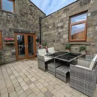 Cozy Cottage Close to Haworth Sleeps 2 with Garden, hotel u gradu Kitli