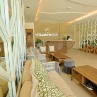 Holiday Suites Puerto Princesa, מלון בפוארטו פרינססה