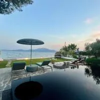Evia Escape - Beachfront villa, Hotel in Skála