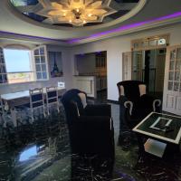 Plage à 1km! Appartement familial paisible avec vue sur MER et MONTAGNE, idéal pour des vacances relaxantes, khách sạn gần Setif Airport - QSF, Souk et Tenine