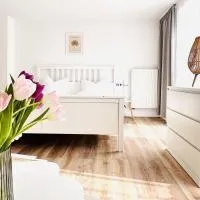 Apartments-am-Wellenreiter-Kuestenstudio, hotel em Tating